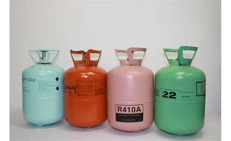 Cylinders of common HVAC refrigerants including R-410A, R-404A, R-134a, and R-22 used in air conditioning and refrigeration systems.