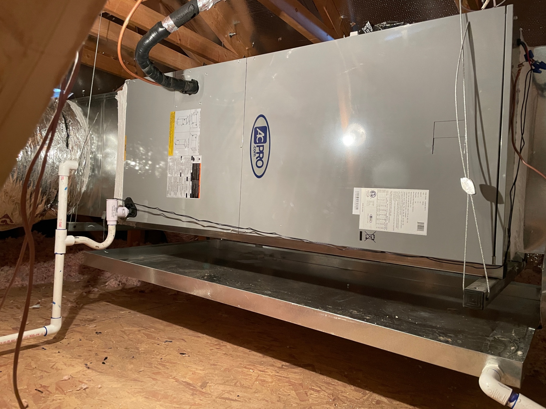 New AC Pro air handler installed in an attic service platform